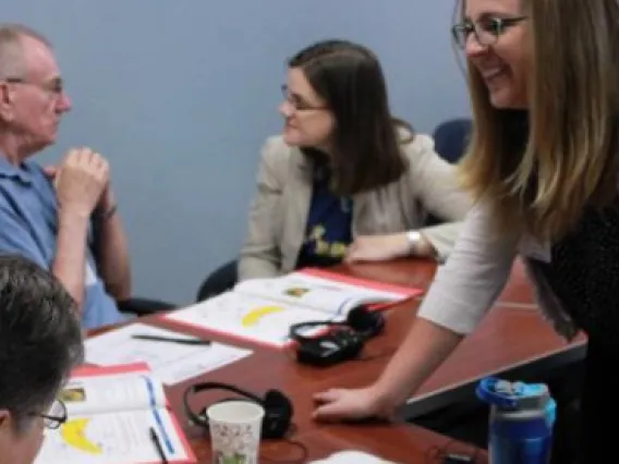 Faculty, student and attendees at a LWHS class